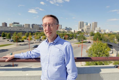 Dale Marciski from Environment Canada is retiring this month. Here he poses at The Forks. BORIS MINKEVICH / WINNIPEG FREE PRESS  Sept. 15, 2014
