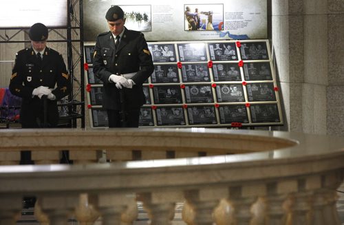 Members of the Canadian Armed Forces during the ceremony to open the Afghanistan Memorial Vigil, a memorial to Canadas 12-year military deployment now on display at the Manitoba Legislative Building. The Vigil is built from the recovered memorial plaques from Kandahar Air Field cenotaph, the Vigil display focuses on fallen Canadians, including the 158 soldiers, a Canadian diplomat, contractor, journalist as well as 40 United States Armed Forces personnel attached to the Canadian Forces. Larry Kusch story Wayne Glowacki/Winnipeg Free Press Sept.16  2014