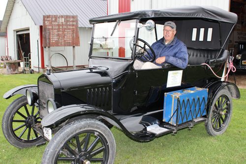 Albert Thompson's eclectic museum collection is going up for auction next month in Ste. Rose. It includes antique vehicles and farm equipment, as well as his own inventions. 074 - Albert Thompson and his 1920 Model T. It's still licensed and can easily hit 90 kph on the highway.  BILL REDEKOP/WINNIPEG FREE PRESS Sept 16,2014