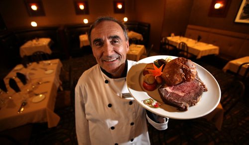 Executive Chef Zdravko Bejatovic holds "Prime Rib and Yorkshire Pudding" at the Rib Room at the Charter House Hotel. See Marion's Review. September 16, 2014 - (Phil Hossack / Winnipeg Free Press)