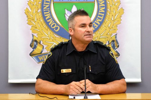 Constable Jason Michalyshen discuses how the WPS will be involved in the search efforts on the Red River. 140917 September 17, 2014 Mike Deal / Winnipeg Free Press