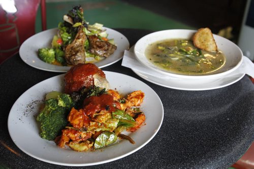 Sunday/XTRA/ This City. In foreground is the Stuffed Meat Ball with Tortellini, Lamb Chops and Veggie Soup at X-Cue's Billiards & Café. This City story by Dave Sanderson. Wayne Glowacki/Winnipeg Free Press Sept.18 2014