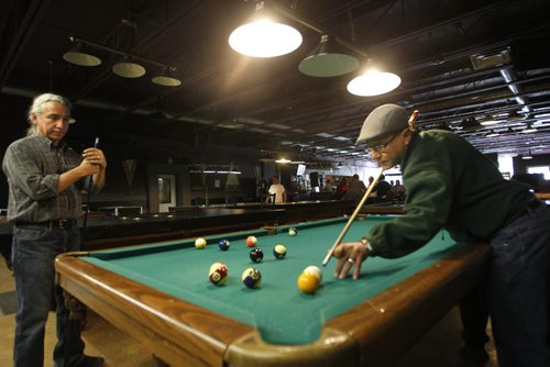 Sunday/XTRA/ This City. At right, Terry Malazdrewich and Richard Armstrong play pool at X-Cue's Billiards & Café. This City story by Dave Sanderson. Wayne Glowacki/Winnipeg Free Press Sept.18 2014