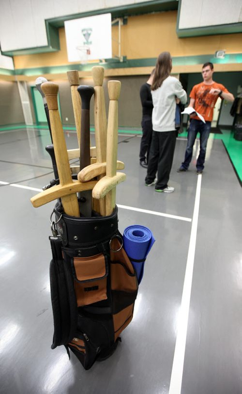 Swords arrive in a golf bag which instructor Cody Skillen carries to the Lord RObertson Community Center where he teaches the art of the German Long Sword. Dave Sanderson's story. September 17, 2014 - (Phil Hossack / Winnipeg Free Press)