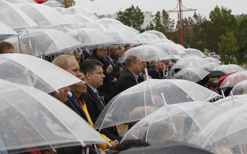 The crowd during a light rain shower during the Canadian Museum for Human Rights  official opening ceremonies Friday. Mary Agnes Welch story.¤Wayne Glowacki/Winnipeg Free Press Sept.19 2014