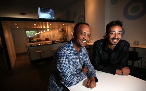 ESEYAS REZENE and GARY TESFATSION (left) , owners of a new bar/restaurant called Bar Red Sea/Red Sea Restaurant, which opened in late July in the former Arkadash Bistro and Lounge and Chocolate Shop location on downtown Portage Avenue. The restaurant  features a combination of traditional North American food, as well as popular dishes from their home country of Eritrea. September 19, 2014 - (Phil Hossack / Winnipeg Free Press)