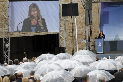 Shelly Glover, Minister of Canadian Heritage addresses the crowd during a light rain shower during the Canadian Museum for Human Rights official opening ceremonies Friday. Mary Agnes Welch story.¤Wayne Glowacki/Winnipeg Free Press Sept.19 2014