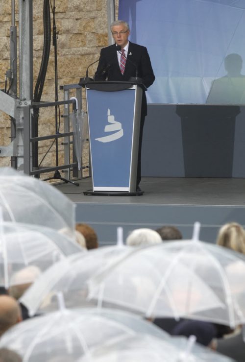 Premier Greg Selinger addresses the crowd during a light rain shower at  the Canadian Museum for Human Rights  official opening ceremonies Friday. Mary Agnes Welch story.¤Wayne Glowacki/Winnipeg Free Press Sept.19 2014