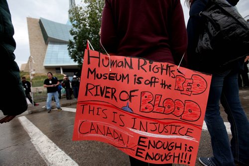 Skye McLean originally from South Indian Lake First Nation was among a small group of protestors outside the opening ceremonies of the Canadian Museum for Human Rights Friday.    Sept 19,  2014 Ruth Bonneville / Winnipeg Free Press