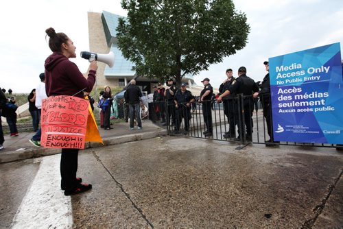 Skye McLean originally from South Indian Lake First Nation was among a small group of protestors outside the opening ceremonies of the Canadian Museum for Human Rights Friday.    Sept 19,  2014 Ruth Bonneville / Winnipeg Free Press