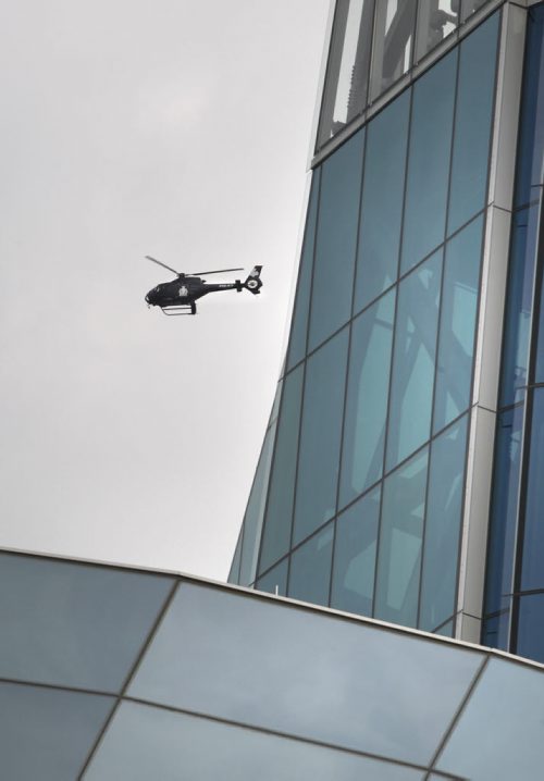 A Police helicopter circles the the Canadian Museum for Human Rights during the opening ceremonies Friday. Mary Agnes Welch story.¤Wayne Glowacki/Winnipeg Free Press Sept.19 2014