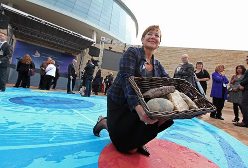 Gail Asper holds basket of stones from all four ends of the earth outside the Canadian Museum for Human Rights after the opening ceremonies Friday.    Sept 19,  2014 Ruth Bonneville / Winnipeg Free Press