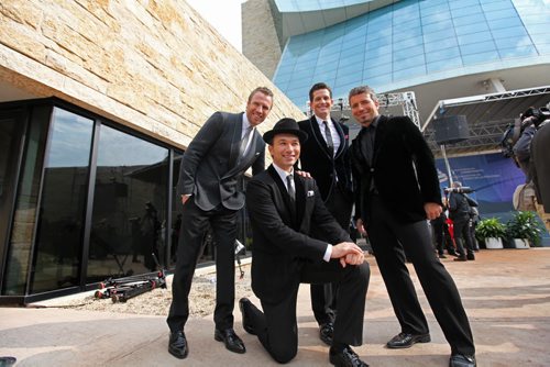 The Tenors  a vocal quartet pose for photos after the opening ceremonies of CMHR.  Band names from L-R,  Clifton Murray (left, blond), Remigio Pereira (rear centre), Fraser Walters (right, grey) and Victor Micallef (hat).   Sept 19,  2014 Ruth Bonneville / Winnipeg Free Press