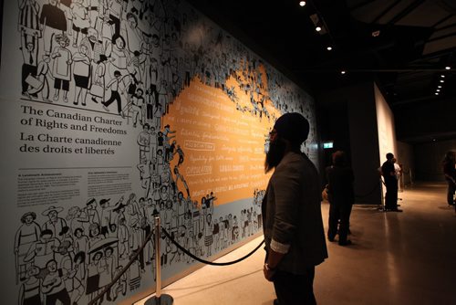 Tour of CMHR - Gallery Installation #4 - Protecting Rights in Canada includes a wall depicting the Canadian Charter for viewers to read through.   Sept 19,  2014 Ruth Bonneville / Winnipeg Free Press