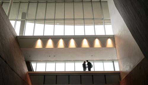 A couple on the walkway above the main entrance during the public's first look inside the Canadian Museum for Human Rights on Saturday. Thousands had reserved tickets for the four gallery preview tour on Saturday and Sunday. That is only four of 11 galleries, the rest of which open September 27th. 140920 - Saturday, September 20, 2014 - (Melissa Tait / Winnipeg Free Press)