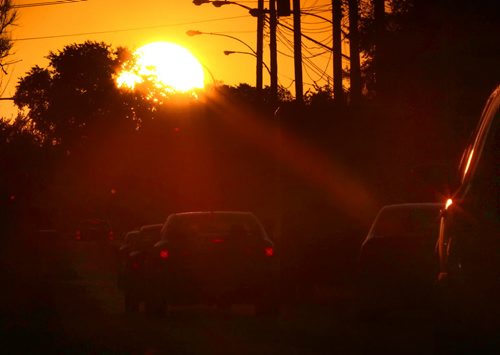 A glorious sunrise this morning as seen beaming on the morning commute on Notre Dame Ave during the first day of Fall-Standup Photo- Sept 23, 2014   (JOE BRYKSA / WINNIPEG FREE PRESS)