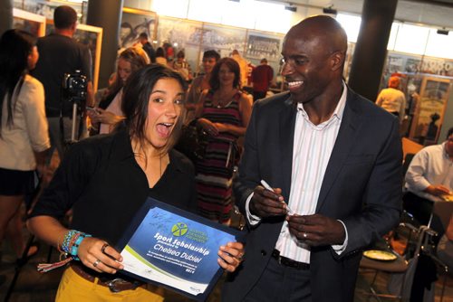 Chelsea Dubiel is stoked about getting to meet and Milt Stegall at the Manitoba Student Athletes & Coaches Awarded event. The event was held at the Manitoba Sport Federation and awarded $25,000 in Scholarships.  BORIS MINKEVICH / WINNIPEG FREE PRESS  Sept. 23, 2014