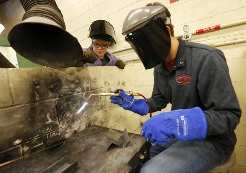 BIZ - non-traditional occupations Red River College Äì Notre Dame campus  ( welding class) left  Shylyte Bloodworth is a welder and teaches pre-employment welding and other trades at RRC. She also advocates for women in non-traditional occupations. The article is about the barriers and to women in non-traditional work and efforts to understand and overcome them. SEPT  23 2014 / KEN GIGLIOTTI / WINNIPEG FREE PRESS