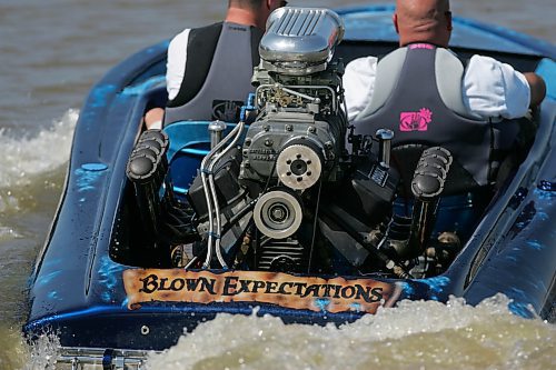 BORIS MINKEVICH / WINNIPEG FREE PRESS  070729 1978 Hondo flat bottom speed boat. Carey Gregorashuk, driver, takes Willy for a rip on the Red River.