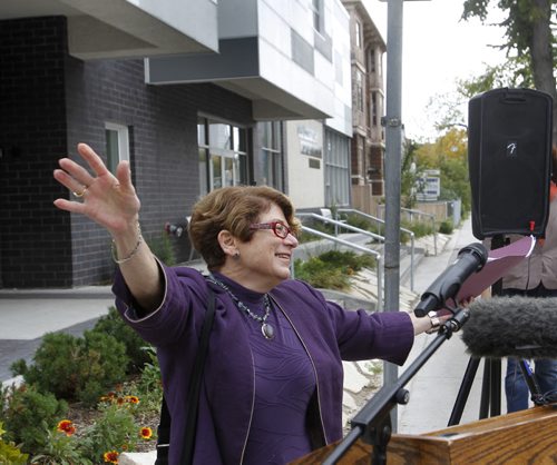 Mayoral candidate Judy Wasylycia-Leis jokes with media prior to  making her housing strategy announcement outside of the Living Gospel Church Family Place on William Ave. Wednesday.  Mary Agnes Welch story Wayne Glowacki/Winnipeg Free Press Sept. 24  2014
