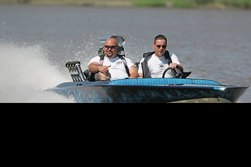 BORIS MINKEVICH / WINNIPEG FREE PRESS  070729 1978 Hondo flat bottom speed boat. Carey Gregorashuk, driver, takes Willy for a rip on the Red River.