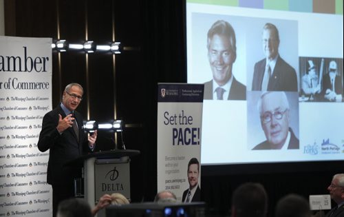 Jim August long-time CEO of Forks North Portage gives his exit speech to the Winnipeg Chamber of Commerce luncheon Wednesday held at the  Delta Hotel. The images projected are some of the political leaders he had the pleasure to work with. Martin Cash story Wayne Glowacki/Winnipeg Free Press Sept. 24  2014