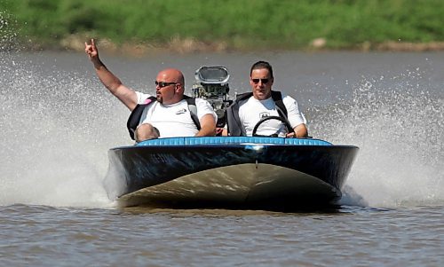 BORIS MINKEVICH / WINNIPEG FREE PRESS  070729 1978 Hondo flat bottom speed boat. Carey Gregorashuk, driver, takes Willy for a rip on the Red River.