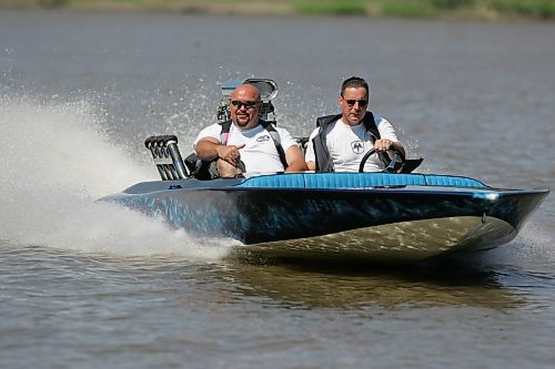 BORIS MINKEVICH / WINNIPEG FREE PRESS  070729 1978 Hondo flat bottom speed boat. Carey Gregorashuk, driver, takes Willy for a rip on the Red River.