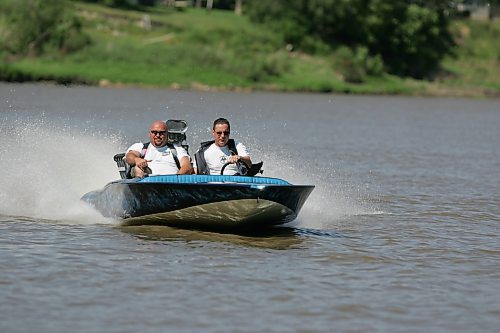 BORIS MINKEVICH / WINNIPEG FREE PRESS  070729 1978 Hondo flat bottom speed boat. Carey Gregorashuk, driver, takes Willy for a rip on the Red River.