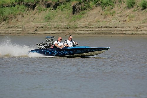 BORIS MINKEVICH / WINNIPEG FREE PRESS  070729 1978 Hondo flat bottom speed boat. Carey Gregorashuk, driver, takes Willy for a rip on the Red River.