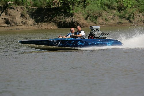 BORIS MINKEVICH / WINNIPEG FREE PRESS  070729 1978 Hondo flat bottom speed boat. Carey Gregorashuk, driver, takes Willy for a rip on the Red River.