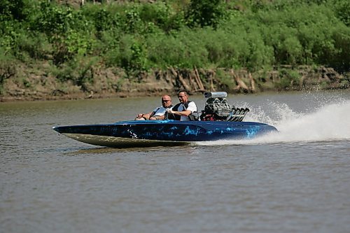 BORIS MINKEVICH / WINNIPEG FREE PRESS  070729 1978 Hondo flat bottom speed boat. Carey Gregorashuk, driver, takes Willy for a rip on the Red River.