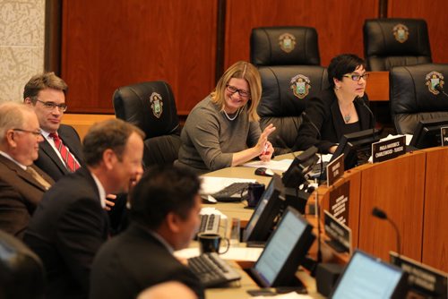 Councillor Paula Havixbeck  laughs with her fellow councillors during session at City Hall on her last day sitting in council Wednesday.    Sept 24,  2014 Ruth Bonneville / Winnipeg Free Press