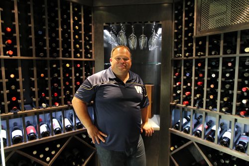 49.8 FEATURE - Wade Miller. Wade is a wine enthusiast and sports a nice wine cellar in the basement of their home in south Winnipeg.  BORIS MINKEVICH / WINNIPEG FREE PRESS  Sept. 24, 2014
