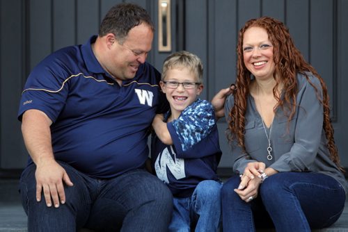 49.8 FEATURE - Wade Miller. Wade with son Branson Miller,8, and partner Melissa Malden at their home in south Winnipeg.  BORIS MINKEVICH / WINNIPEG FREE PRESS  Sept. 24, 2014