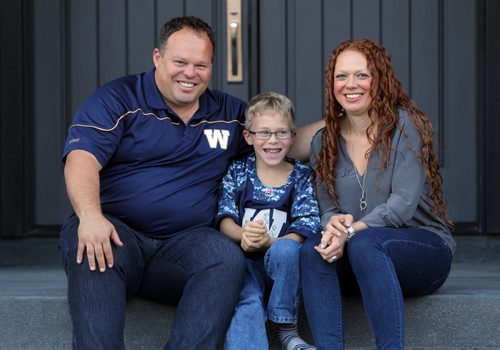 49.8 FEATURE - Wade Miller. Wade with son Branson Miller,8, and partner Melissa Malden at their home in south Winnipeg.  BORIS MINKEVICH / WINNIPEG FREE PRESS  Sept. 24, 2014
