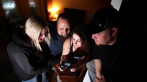 Left to Right, Jamie Dreger, Tom Corrigan, Michelle Caron and Adam Dreger-Dejarlais demonstrate how they would examine evidence of ghosts at a scene. See Sanderson's story. September 25, 2014 - (Phil Hossack / Winnipeg Free Press)