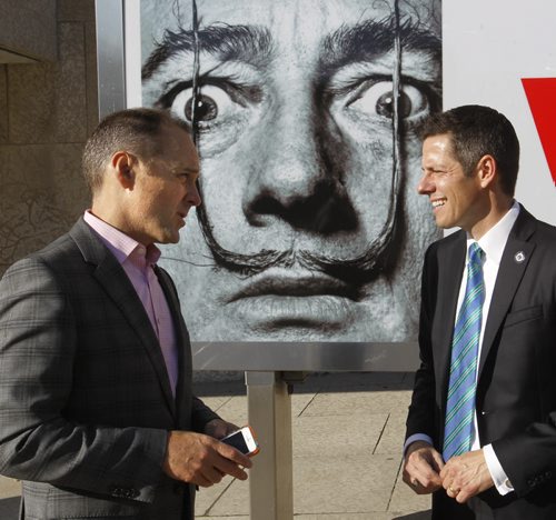 At right, Mayoral Candidate Brian Bowman with Stephen Borys, Director & CEO of the Winnipeg Art Gallery by Salvador Dali poster, after Bowman made a policy announcement outside the Winnipeg Art Gallery Friday morning. Aldo Santin story Wayne Glowacki/Winnipeg Free Press Sept.26 2014