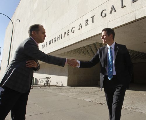 At right, Mayoral Candidate Brian Bowman with Stephen Borys, Director & CEO of the Winnipeg Art Gallery, after Bowman made a policy announcement outside the Winnipeg Art Gallery Friday morning. Aldo Santin story Wayne Glowacki/Winnipeg Free Press Sept.26 2014