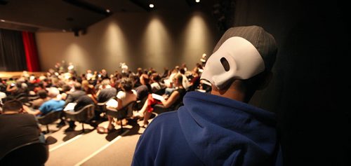 A spectator wears a "Phontom of the Opera" mask Friday at a Mayoral debate on the arts. See story. September 26, 2014 - (Phil Hossack / Winnipeg Free Press)