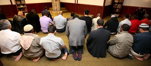 Muslim men pray at a downtown Winnipeg Mosque before a press conference as RCMP and Islamic groups launch a new handbook to combat terrorism Monday afternoon. See Alex Paul's story. September 29, 2014 - (Phil Hossack / Winnipeg Free Press)