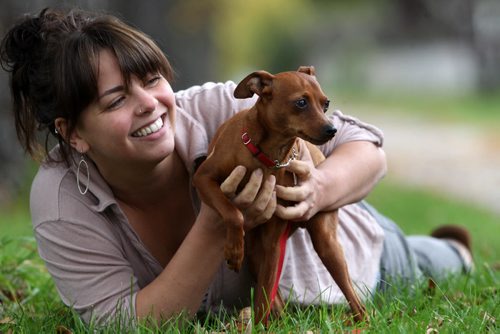 Dog owner Katie Muirhead is looking for the driver of a truck who struck her puppy- a miniature pinscher named Petri- on Cambridge Street in  River Heights.-See Gordon Sinclair story- Sept 29, 2014   (JOE BRYKSA / WINNIPEG FREE PRESS)
