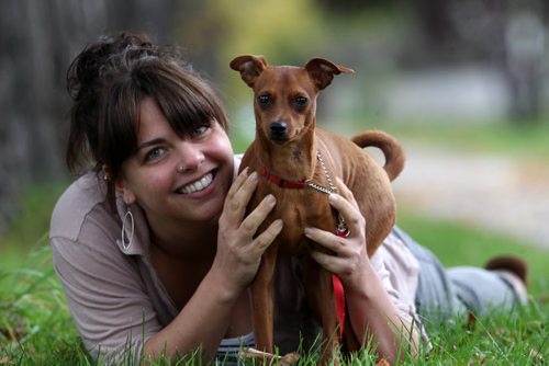 Dog owner Katie Muirhead is looking for the driver of a truck who struck her puppy- a miniature pinscher named Petri- on Cambridge Street in  River Heights.-See Gordon Sinclair story- Sept 29, 2014   (JOE BRYKSA / WINNIPEG FREE PRESS)