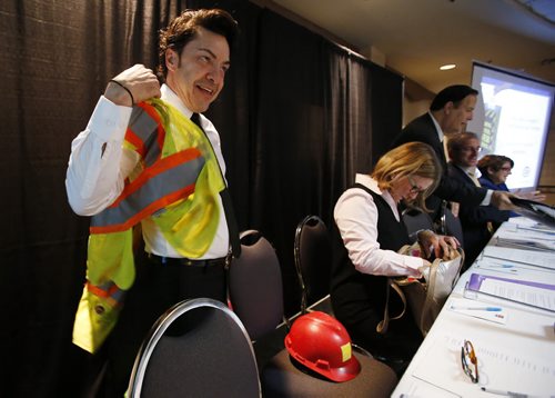 September 29, 2014 - 140929  -  Michel Fillion wore a safety vest and hard hat to a CAA infrastructure debate. Mayoral candidates Brian Bowman, Michel Fillion, Paula Havixbeck, Robert Falcon Ouellette, David Sanders, Gord Steeves and Judy Wasylycia-Leis were on hand to debate the issues at a CAA forum in Winnipeg, Monday, September 29, 2014. John Woods / Winnipeg Free Press