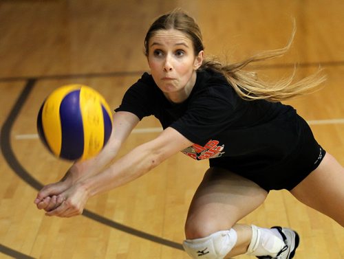 Caleigh Dobie at a team workout Wednesday afternoon at the U of M's Investors Group Athletic Centre. See story. October 30, 2014 - (Phil Hossack / Winnipeg Free Press) University of Manitoba bison women's volleyball