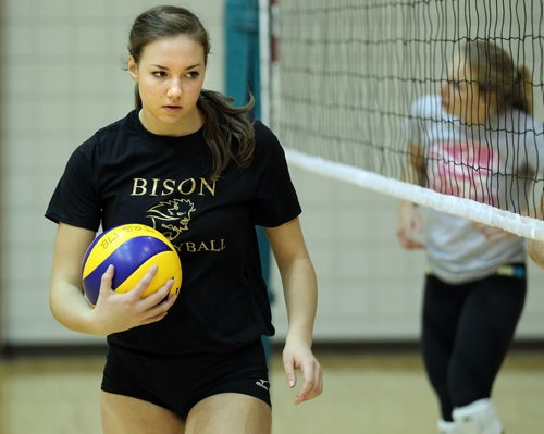 Kalena Schulz at a team workout Wednesday afternoon at the U of M's Investors Group Athletic Centre. See story. October 30, 2014 - (Phil Hossack / Winnipeg Free Press) University of Manitoba bison women's volleyball