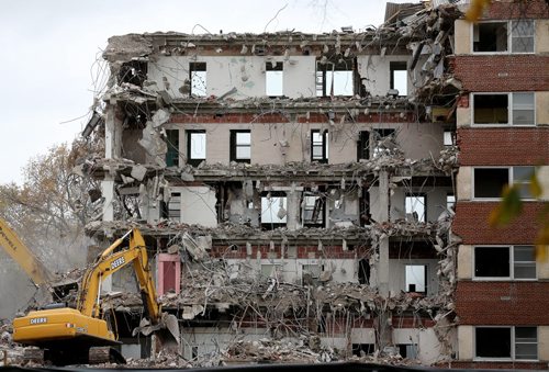 A demolition crew taking down a large building on Arlington Street between Preston and Westminster Avenue, Friday, October 3, 2014. (TREVOR HAGAN/WINNIPEG FREE PRESS)