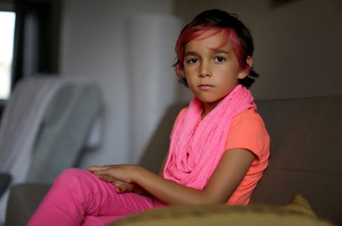 Isabella Burgos, 8, a transgendered youth who is being bullied at her school by a parent of another student. Friday, October 3, 2014. (TREVOR HAGAN/WINNIPEG FREE PRESS)