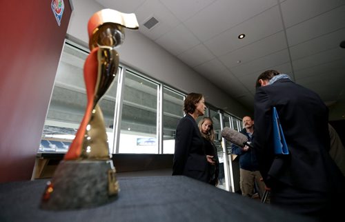The winners trophy near where Tatjana Haenni, FIFA's Head of Women's Competitions, answering questions at Investors Group Field, Saturday, October 4, 2014. (TREVOR HAGAN/WINNIPEG FREE PRESS)