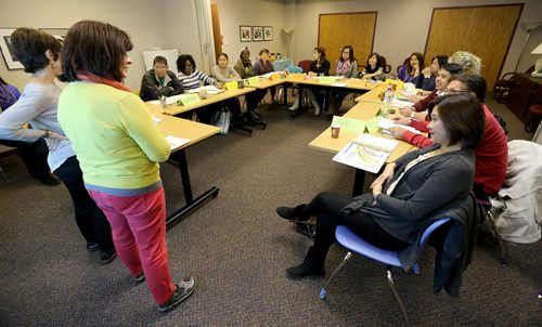 A class in session at Family Dynamics non-profit agency for newcomers, Saturday, October 4, 2014. (TREVOR HAGAN/WINNIPEG FREE PRESS)